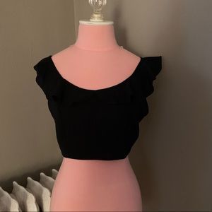 Black top with ruffle detail